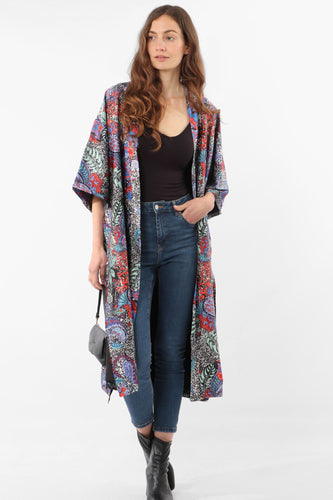 silky multi colour paisley print kimono worn with jeans and boots.