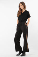 Load image into Gallery viewer, black wearable trouser with copper glitter stripe down the side seam.  Elasticated waist in soft fabric.  Wear with trainers or heels for evening.