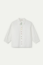 Load image into Gallery viewer, A white long-sleeve button-up shirt with colorful buttons down the front, displayed flat against a light off-white background.