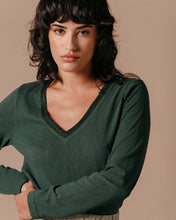 Load image into Gallery viewer, The Lewis is a long-sleeved, V-neck dark green T-shirt with a ribbed neckline finished in iridescent lurex. Glamourous yet relaxed style, wear smart or casual.