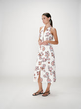 Load image into Gallery viewer, Woman wearing a floral dress on a white background