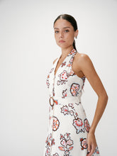 Load image into Gallery viewer, Woman wearing a floral dress against a white background