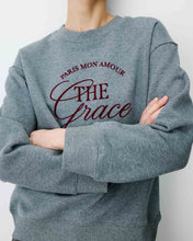 Load image into Gallery viewer, The Grace and Mila Armandio sweatshirt features a relaxed oversized silhouette so it is comfortable and easy to wear, inspired by classic college style. This sweatshirt has long sleeves, a crew neck with a printed slogan on the front and ribbed trims at the cuff.