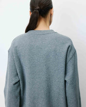 Load image into Gallery viewer, The Grace and Mila Armandio sweatshirt features a relaxed oversized silhouette so it is comfortable and easy to wear, inspired by classic college style. This sweatshirt has long sleeves, a crew neck with a printed slogan on the front and ribbed trims at the cuff.
