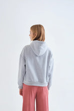 Load image into Gallery viewer, Compania Fantastica grey hooded sweatshirt with geometric print drawstring tie and plain back.