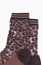 Load image into Gallery viewer, A pair of fun leopard print sheer socks in classic brown print with a ribbed edge at the ankle.  They feature a premium combed cotton sole. Designed for a supremely comfortable fit, so not only fabulous, comfy to wear as well! 